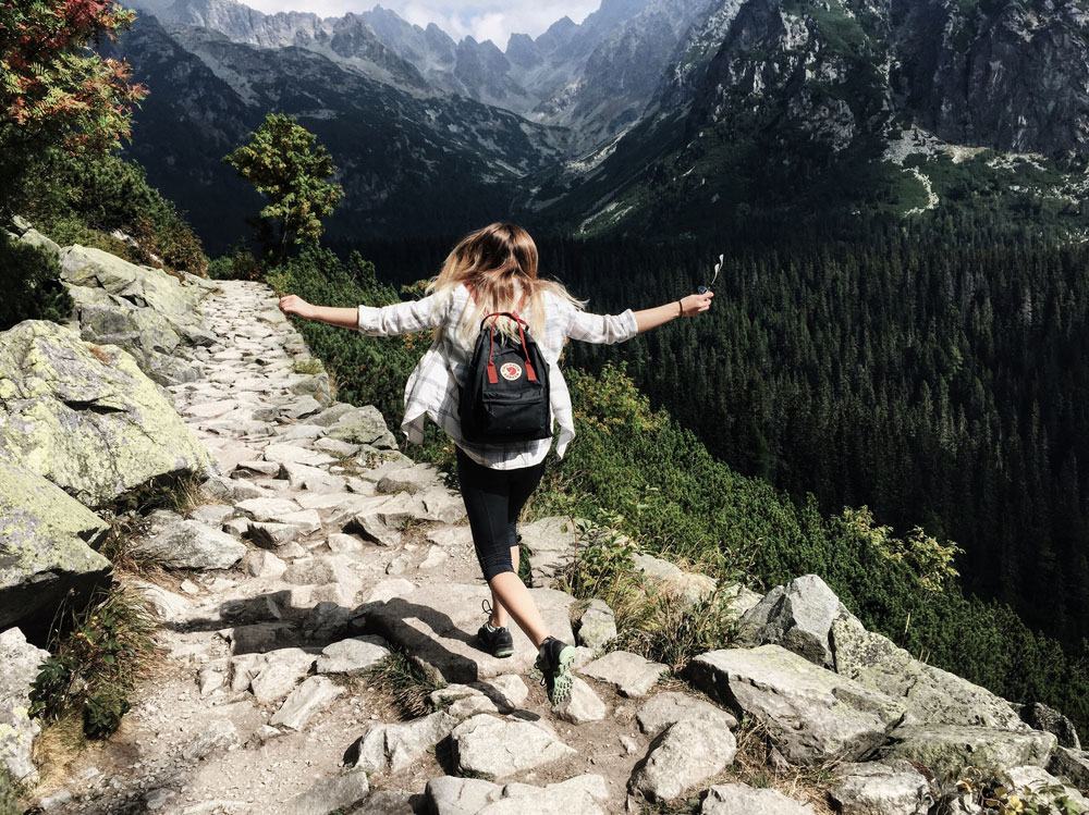 Hiker on a rocky mountain trail